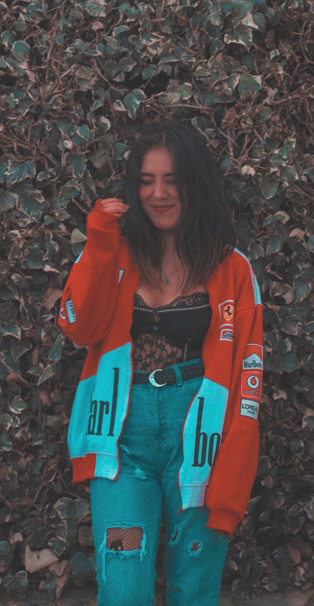 woman wearing red and white zip-up jacket